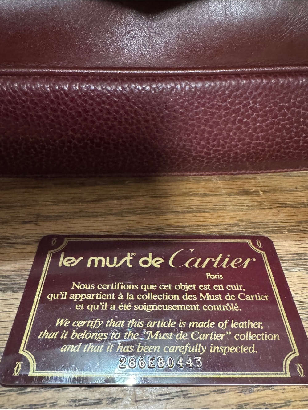 Cartier Men's Wine Burgundy Leather Clutch with Gold Accent - Picture 6 of 6